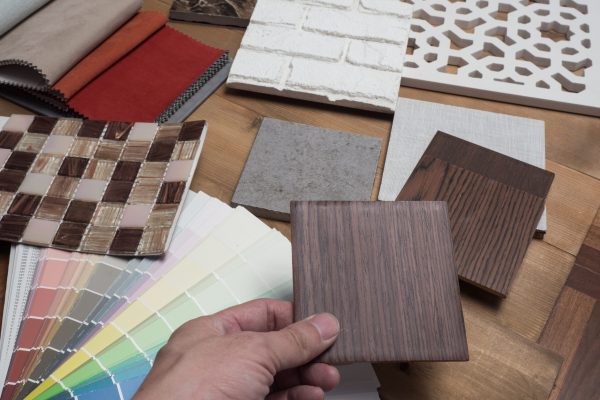 Samples of material, wood , on concrete table.Interior design select material for idea. Decoration idea concept vintage material.